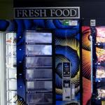 Vending machines with an assortment of chips and soda