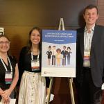 Past Participants from CDC and ChangeLab's legal epi learning cohort pose next to a sign.