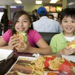 Children eating at a fast food restaurant